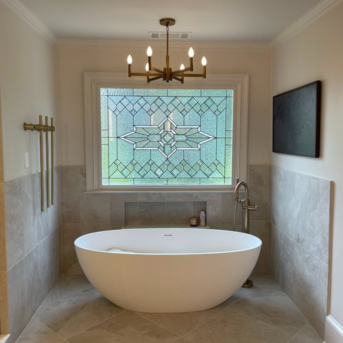 Leaded glass privacy window in a luxurious bathroom by Bridgeport Carpets & Flooring