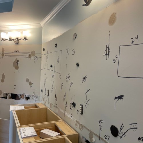 Writing on bathroom wall during remodel process