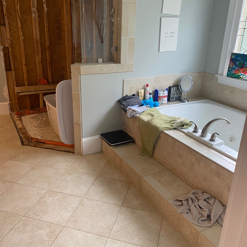 Outdated tile flooring before remodel