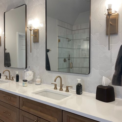 Stylish bathroom vanity with double sinks and white countertops