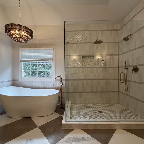 Stylish bathroom shower with vintage look tile flooring