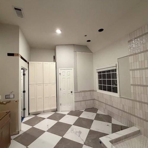 New vintage style tile flooring being installed