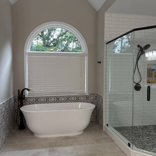 Master bathroom with new bathtub and valued ceilings