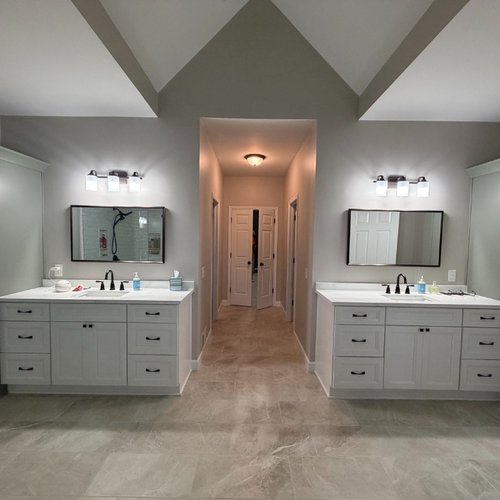 Double bathroom vanity in a master bathroom by Bridgeport Carpets