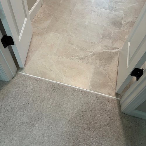 Tile and carpet transition by Bridgeport Carpets