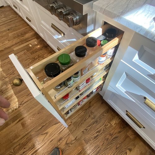 Narrow kitchen cabinet storage solution