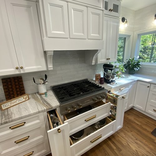New kitchen with stovetop installed by Bridgeport Carpets