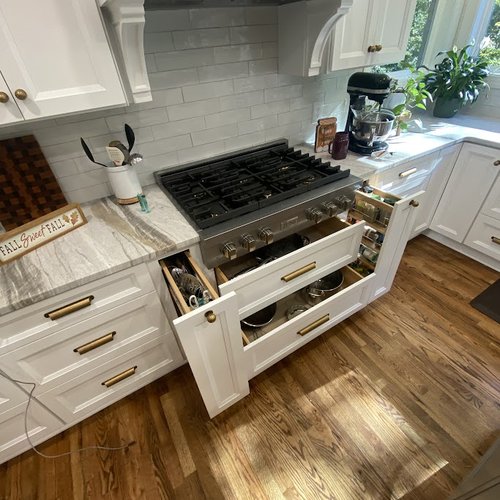 Hidden storage under kitchen stove