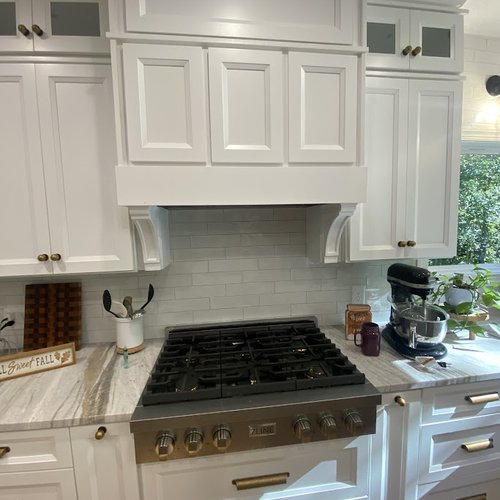 White kitchen backsplash installed by Bridgeport Carpets