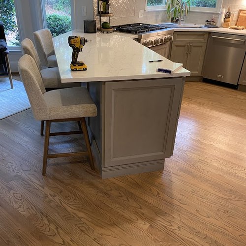 Vintage hardwood flooring in a modern kitchen