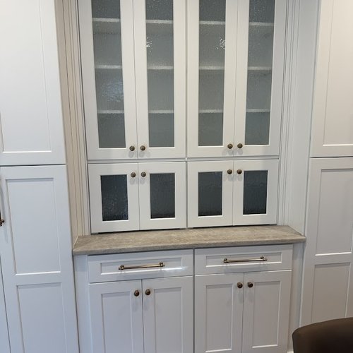White kitchen cabinetry installed by Bridgeport Carpets