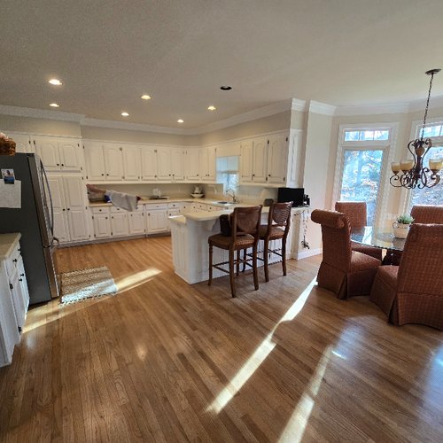 Narrow plank flooring in an outdated kitchen