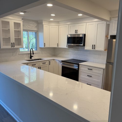 New kitchen countertops with a white marble finish