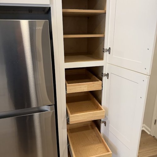 Comprehensive kitchen storage by Bridgeport Carpets