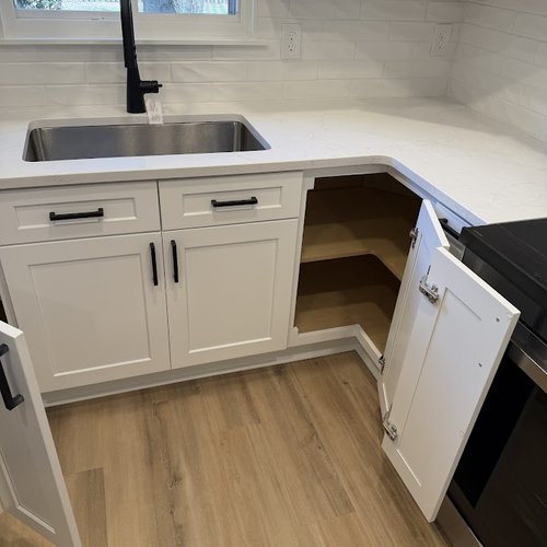 Corner cabinet in a kitchen installed by Bridgeport Carpets