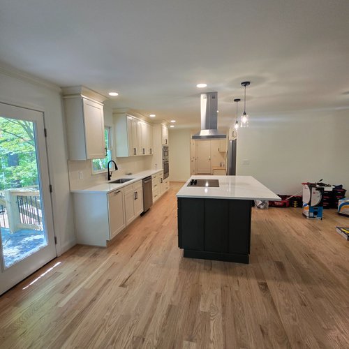New laminate flooring in an open concept kitchen