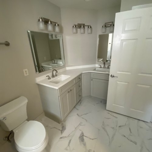 Marble tile on a bathroom floor installed by Bridgeport Carpets & Floors