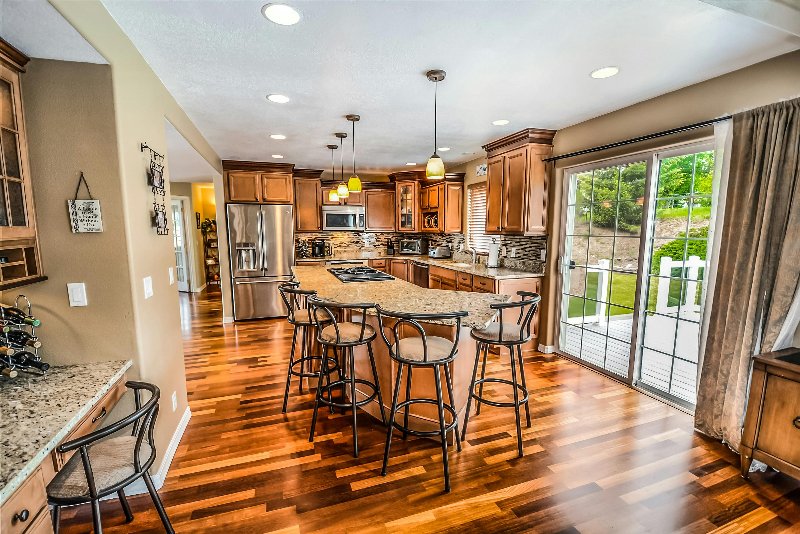 Traditional Kitchen with wood flooring