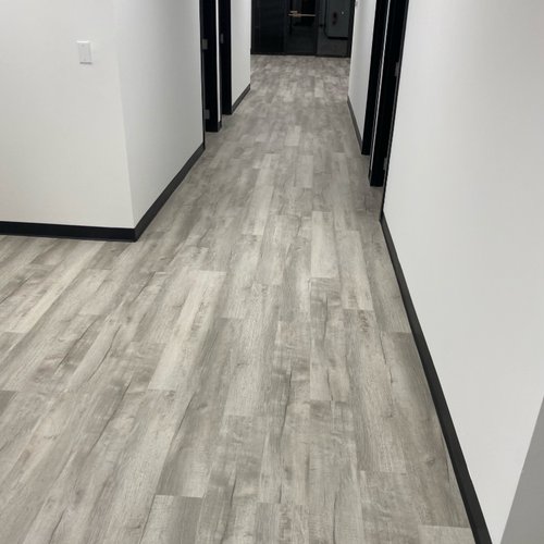 Hallway in a corporate building with new flooring by Bridgeport Carpets & Flooring