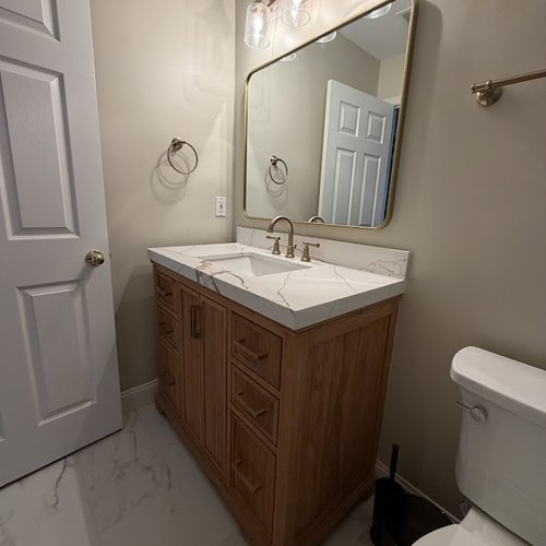 New bathroom sink vanity installed by Bridgeport Carpets & Flooring