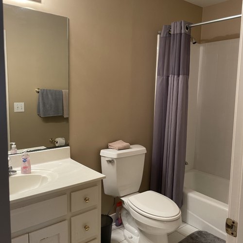 Dated bathroom before makeover by Bridgeport Carpets & Flooring