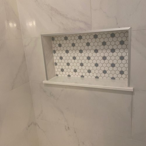 Honeycomb tiles in a bathroom shower