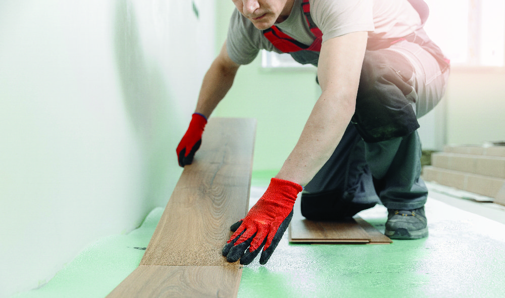 Man installing floor