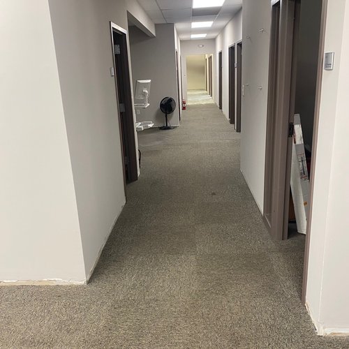 Office hallway with carpet flooring by Bridgeport Carpet & Flooring