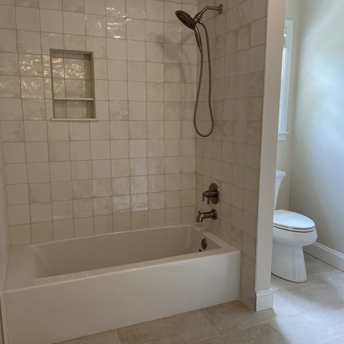 Bathroom with beige glazed tiles