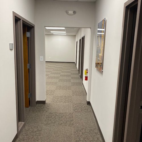 Commercial carpet flooring in an office hallway by Bridgeport Carpets