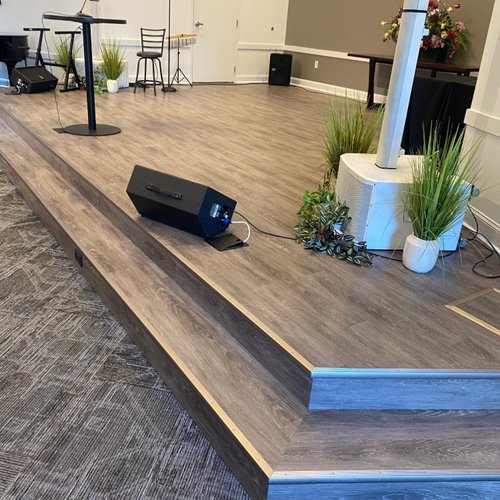 Commercial space in Alpharetta GA with patterened carpet and LVT flooring