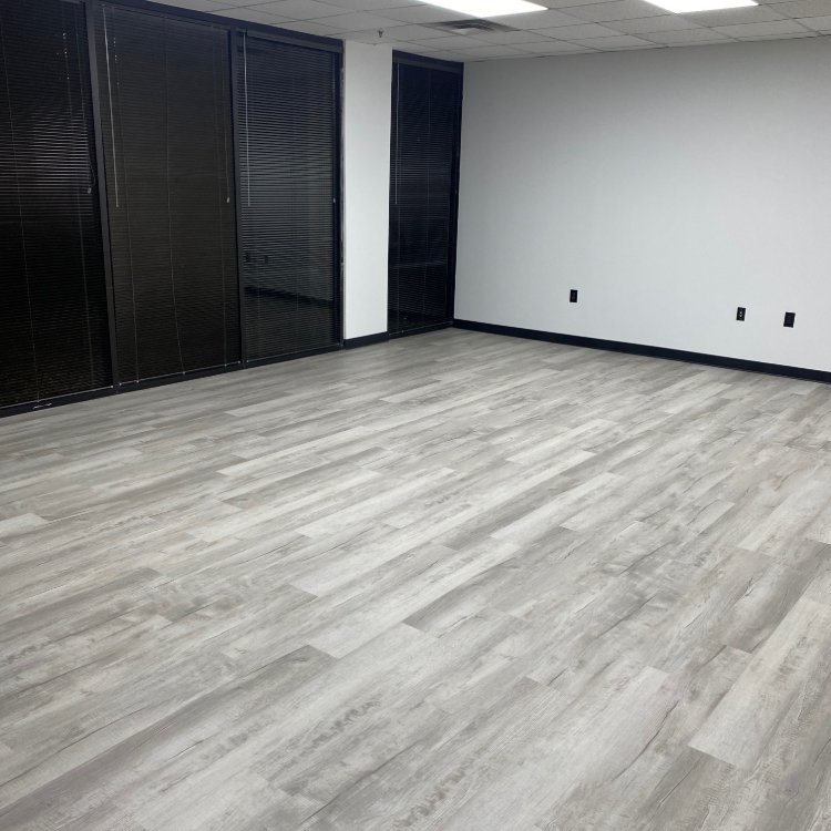 Empty office space with new flooring in Alpharetta GA