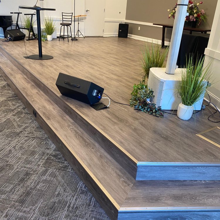 Commercial space in Alpharetta GA with patterened carpet and LVT flooring