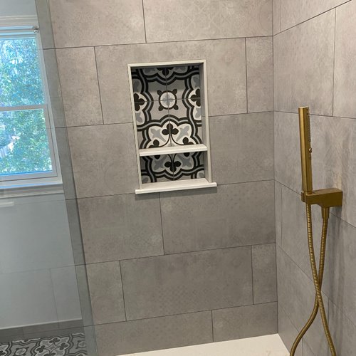 Tile Accents in a custom bathroom makeover by Bridgeport Carpets