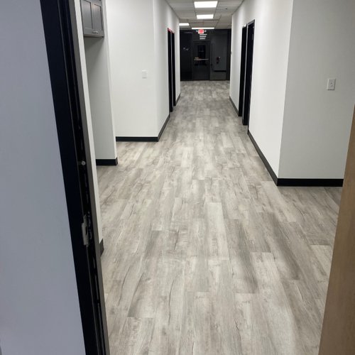 LVP flooring in a corporate hallway in Alpharetta GA