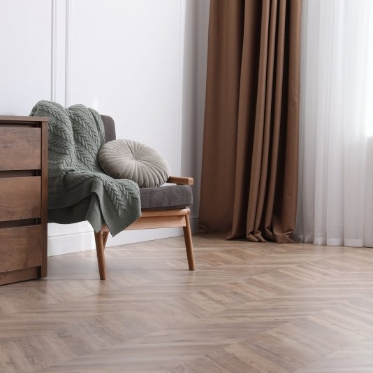 Seating area with herringbone flooring