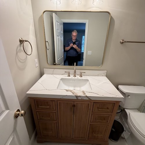 New bathroom with white marble countertop