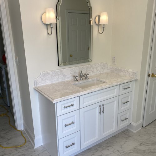 Bathroom in GA with Marbled Counters