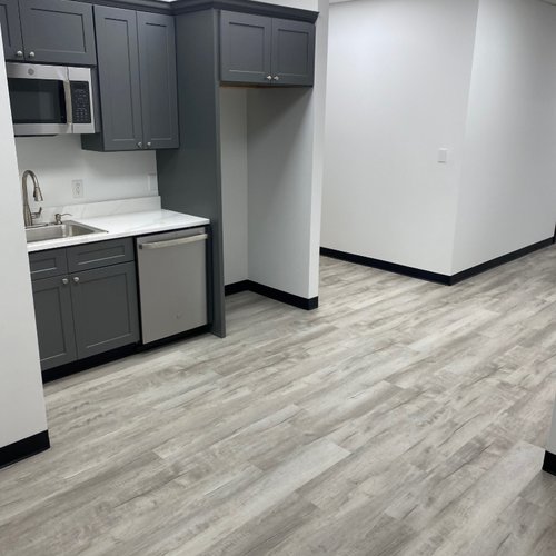 Lunch room with new flooring by Bridgeport Carpets & Flooring