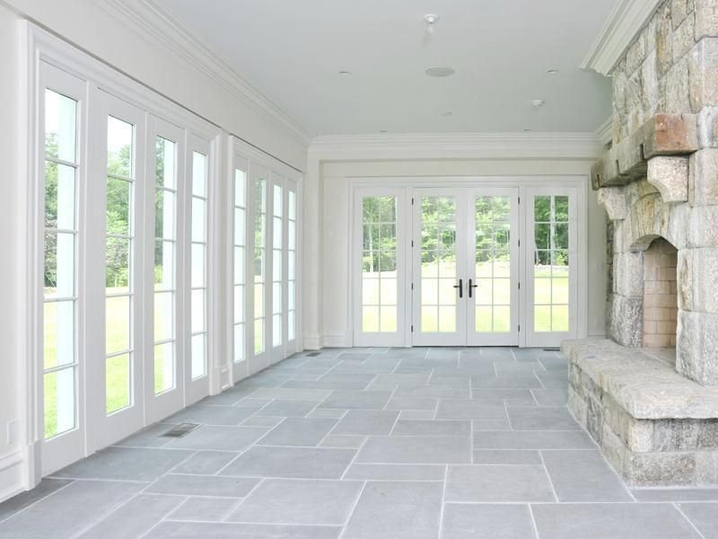 Tile flooring in a bright sunroom