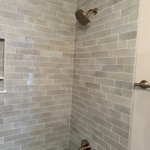 Shower tile makeover by Bridgeport Carpets & Flooring