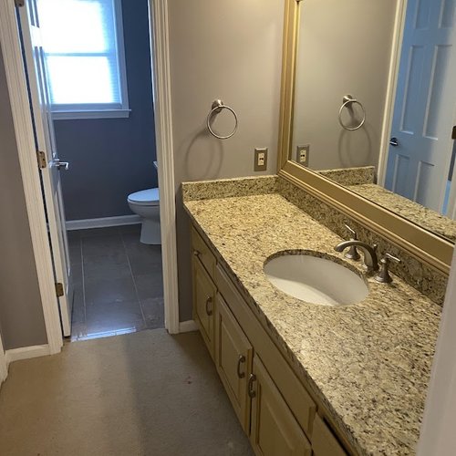 Dated bathroom counter in Alpharetta, GA