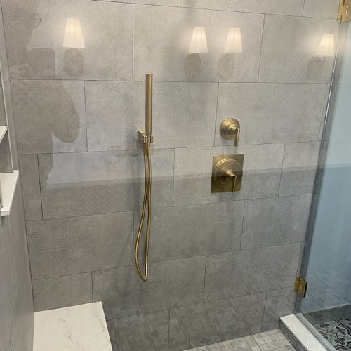 Grey shower with gold accents