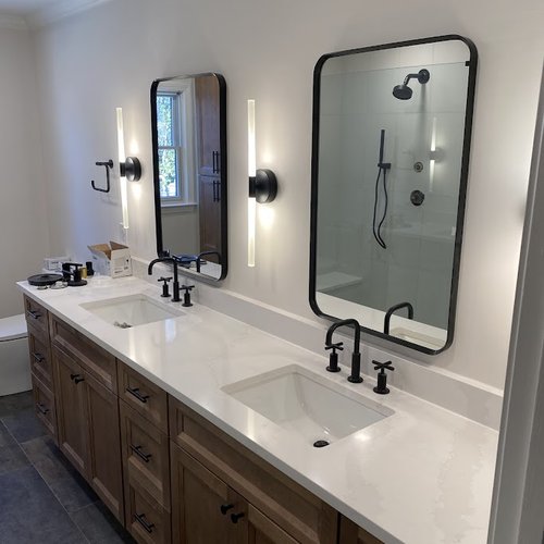 Black mirrors over new modern vanity installed by Bridgeport Carpets & Flooring