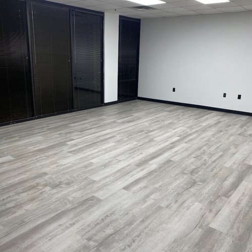 Empty office space with new flooring in Alpharetta GA